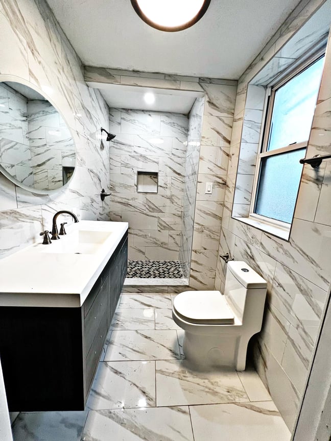 Floor to Ceiling Marble Tile Bathroom Remodel in Pittsburgh